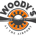 Woody’s-at-the-airport-Logo