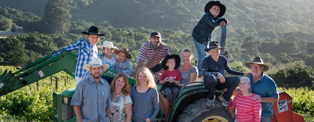 ParsonageFamilyOnTractor_1328x500